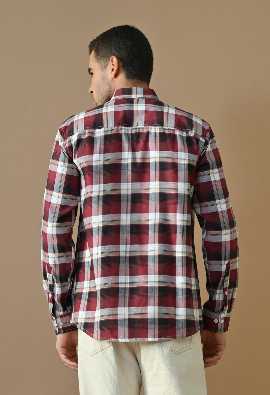 Back view of a man wearing the Urban Woodsman Essential shirt