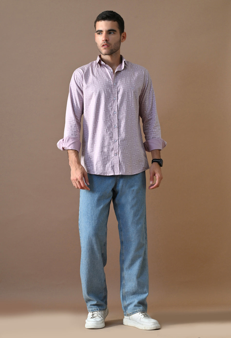 Man wearing the Pastel Pixel Shirt By Outsyn with blue jeans